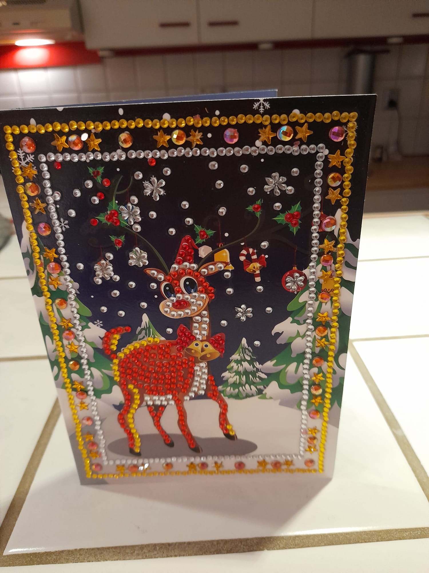 Kerstkaart Rendier in Bos